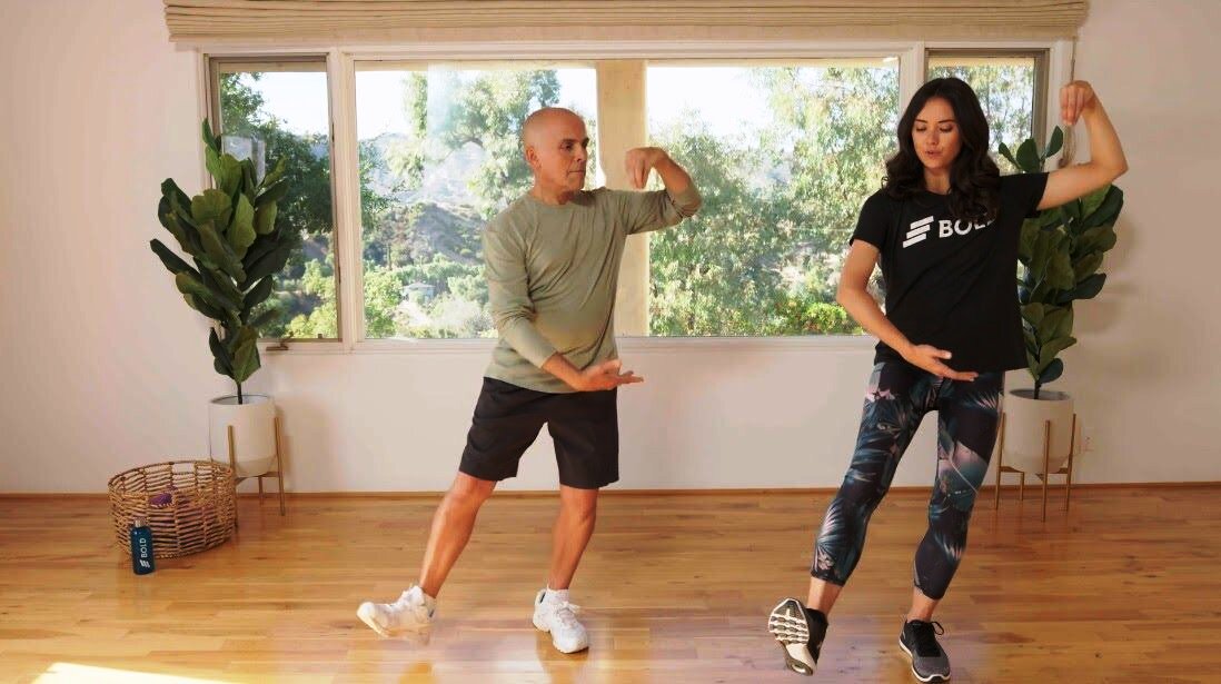 Image of a trainer and a senior doing Tai Chi at Bold fitness startup