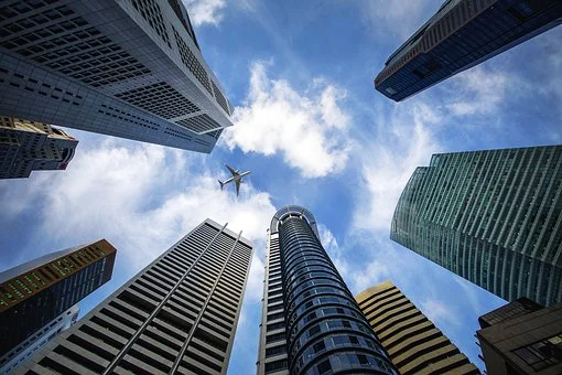 Image of buildings and an airplane, depicting the state of the venture capital industry today.